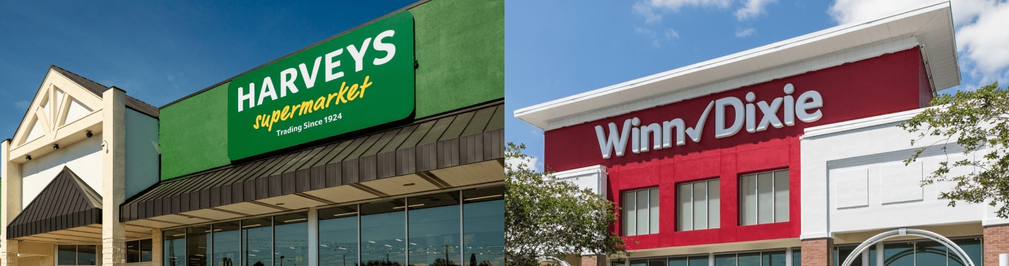Harveys Supermarket storefront on the left. Winn-Dixie storefront on the right.