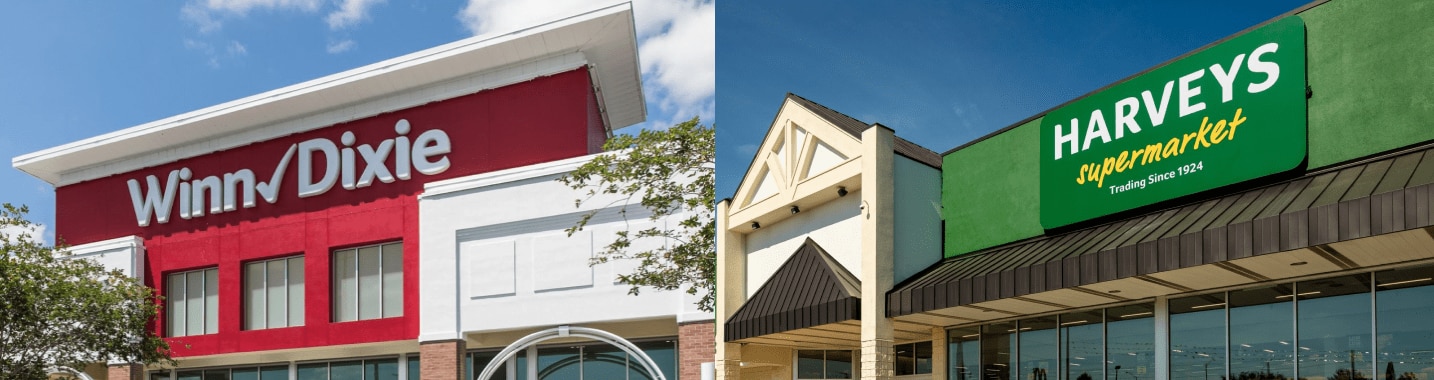 Winn-Dixie storefront on the left. Harveys Supermarket storefront on the right. 