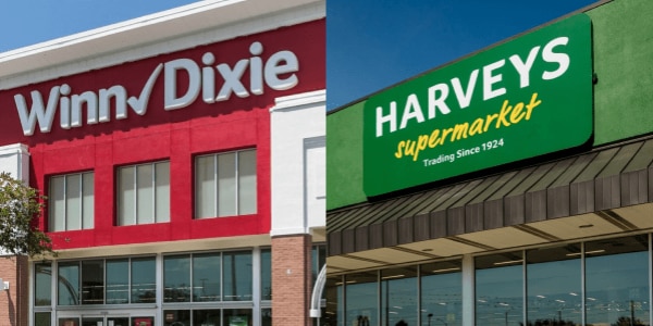 Winn-Dixie storefront on the left. Harveys Supermarket storefront on the right. 